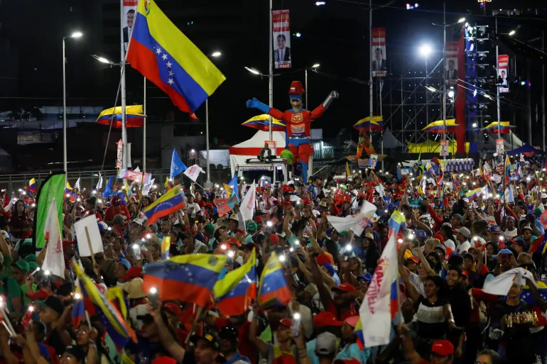 Apoiadores de Nicolás Maduro se reúnem em Caracas para campanha eleitoral. Foto por Fausto Torrealba/Reuters [CC-BY-4.0].